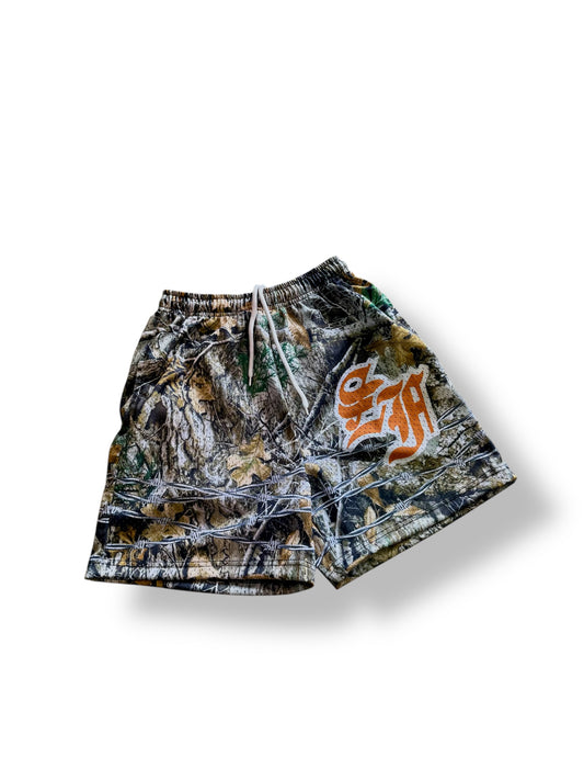 -BARBED CAMO MESH SHORTS